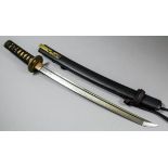 A Japanese Wakizashi, the 16.5ins polished blade with wave pattern hamon, signed "Norimitsu Saku",