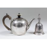 A George III bachelor's plain silver bulbous teapot with reeded oval ivory finial and fruitwood