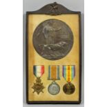 A group of three George V First World War medals and bronze death plaque to "2nd Lieutenant Giles