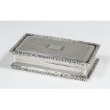 A William IV silver rectangular snuff box with engine turned decoration with scroll cast mounts, 2.