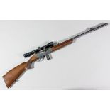 An Anschutz 520, .22 calibre semi automatic rifle, Serial No. 056215, bright blacked barrel,