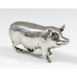 A Victorian silver pig pattern condiment, 3ins overall x 1.5ins high, by J. B., London 1880 (