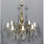 A 20th Century gilt metal eight sconce electrolier of 19th Century design with candle fitments,