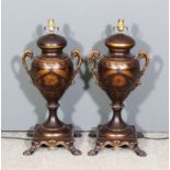 A pair of modern jappaned metal, two handled urn shape table lamps, of 19th Century design,