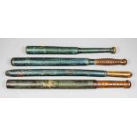 An early 19th Century turned wood truncheon decorated with a crowned figure of a stag on a blue