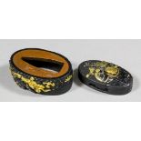 A good Shakudu Japanese sword Kashira (end cap) and Fuchi (front cap), signed Mitsuyoshi (Yanagawa