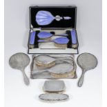 A George V silver and blue guilloche enamel backed five piece dressing table set, comprising -