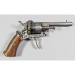 A 7mm six shot pocket revolver, the 3ins bright steel barrel and action, engraving to cylinder and