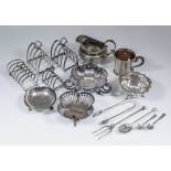 A pair of George VI silver four division toast racks of lancet design, 4ins x 2.5ins x 4.5ins by