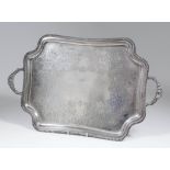 A late Victorian silver two-handled tray of shaped outline with gadroon mounts, gadroon and shell