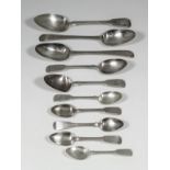 Five George III silver Old English and bright cut table spoons, various dates and makers (one