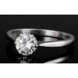 A modern platinum mounted diamond solitaire ring, the brilliant cut stone approximately .80ct (gross