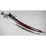 A good late 18th/ early 19th Century Indian Tulwar with a 30ins fine pattern welded blade, the