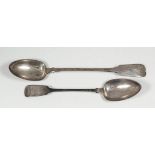 A Victorian silver fiddle pattern gravy spoon by Josiah Williams & Co, Exeter 1854, and a George