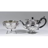 A Victorian silver bachelors circular teapot with shaped rim, the lid and body with part spiral