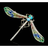 A gold coloured metal mounted plique a  jour diamond and turquoise set dragonfly pattern brooch in