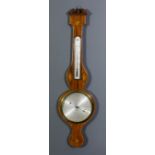 A 19th Century mahogany cased wheel barometer and thermometer by C Farelli of Northampton, the