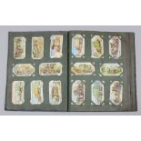 An interesting small collection of early 20th Century and later cigarette cards, including - part