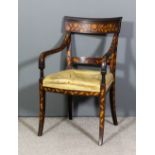 An early 19th Century Dutch mahogany and marquetry armchair of "Empire" Design, the wide crest