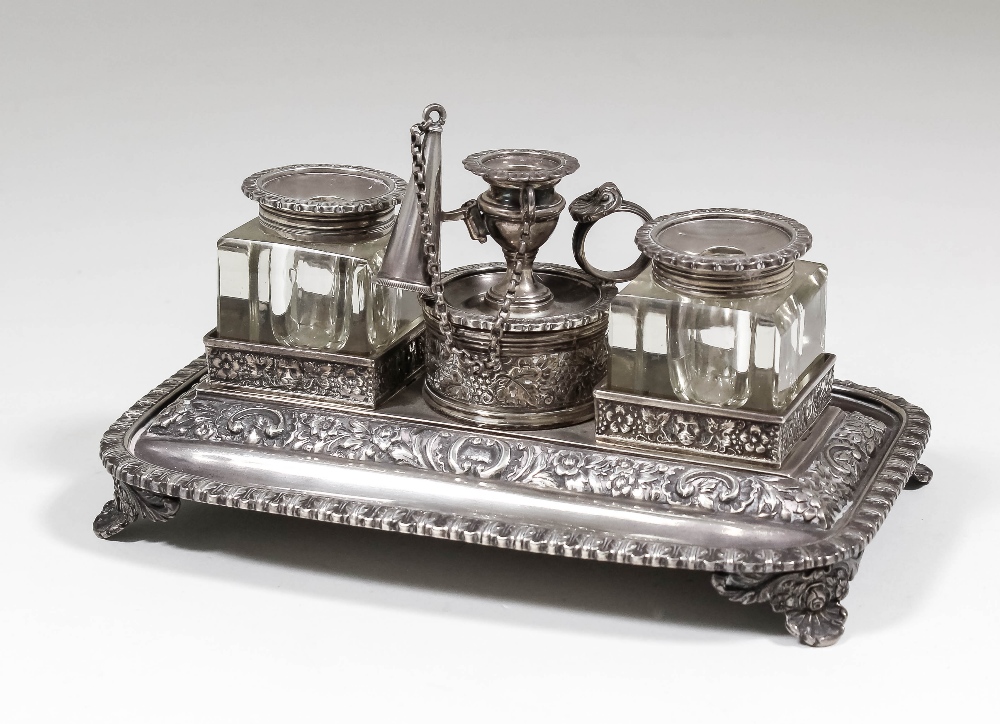 A George V silver rectangular inkstand with leaf cast rim, and scroll floral, leaf and vine cast