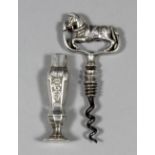 A late 18th/ early 19th Century Dutch silvery metal pocket corkscrew, the T-shaped handle surmounted