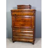 A 19th Century South German figured mahogany Secretaire a Abattant, fitted two drawers above paneled