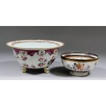 A 19th Century French porcelain bowl, standing on three feet and with averted rim, enamelled and