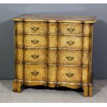 A walnut chest of drawers of late 17th Century Continental design with shaped and moulded edge to