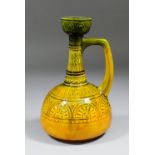 An Ault pottery "Persian" jug of "Aesthetic Movement" inspiration, originally designed by Dr.