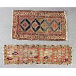 An Afshar rug woven in colours with four central lozenge shaped medallions with serrated edges, on a