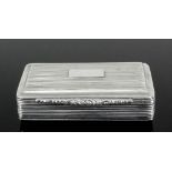 A William IV silver rectangular snuff box of reeded form with cast silver leaf scroll pattern