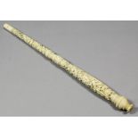 A late 19th/early 20th Century Chinese "Cantonese" turned ivory parasol handle, the whole finely