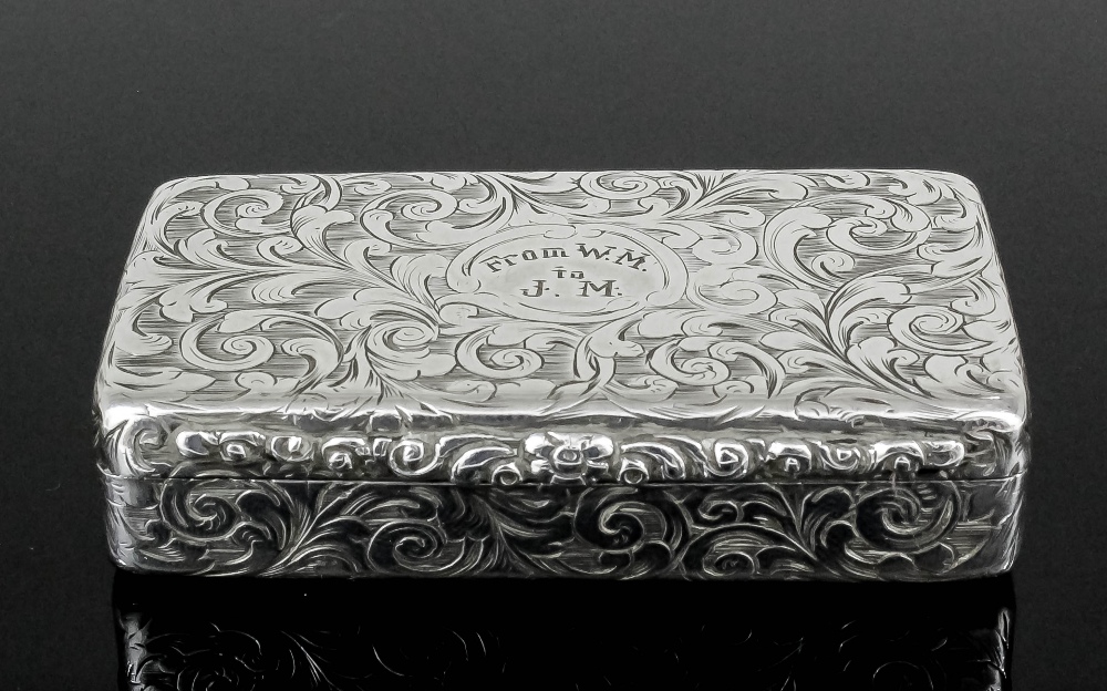 An early Victorian silver rectangular snuff box, all boldly engraved with leaf scroll ornament and