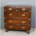 A late 19th Century brass bound teak military chest in two sections, fitted two short and three long