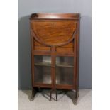 An Edwardian mahogany tray top Secretaire, the fall-front inlaid with chevron stringings,