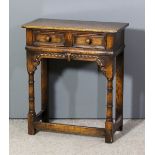 A Titchmarsh & Goodwin oak side table, fitted one frieze drawer with moulded front, carved frieze