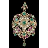 An Indian gold coloured metal mounted pearl, ruby and emerald set pendant or brooch at will, the