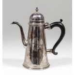 A silvery metal cylindrical coffee pot of 18th century design of tapered form with domed lid and