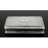 A George IV silver rectangular snuff box with incurved sides, the lid and base with engine turned