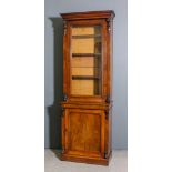 A Victorian mahogany bookcase with carved and scrolled brackets to front, the upper part with