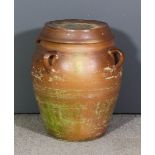 A brown salt glazed four handled stoneware bread crock and cover of large size, 19ins diameter x