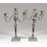 A pair of 19th Century plated four light candelabra of Neo-Classical design with bead mounts, with