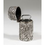 A Late Victorian silver cylindrical salts bottle with clear glass liner and stopper, the silver body