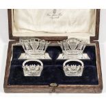 Two pairs of George V silver Naval menu holders cast with various emblems set within crowns, on