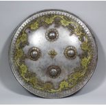 A good 19th Century Indo Persian circular steel shield, the surface with four bosses and applied