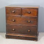 A Victorian mahogany chest of drawers with square moulded edge to top, fitted two short and two long