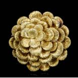 A late 1960s Kutchinsky 18ct gold flowerhead pattern brooch with raised and textured petals, 40mm