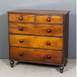 A late Georgian mahogany chest of drawers, the top with moulded edge, fitted two short and three