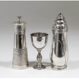 An Elizabeth II silver cylindrical pepper mill of tapered form with textured bands, 5ins high, by