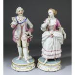 A pair of 19th Century French porcelain figures of a gallant and his lady in 18th Century dress,